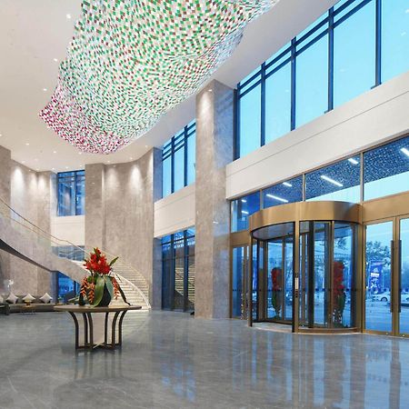 Park Inn By Radisson Nanchong Yilong Star City Plaza Exterior foto