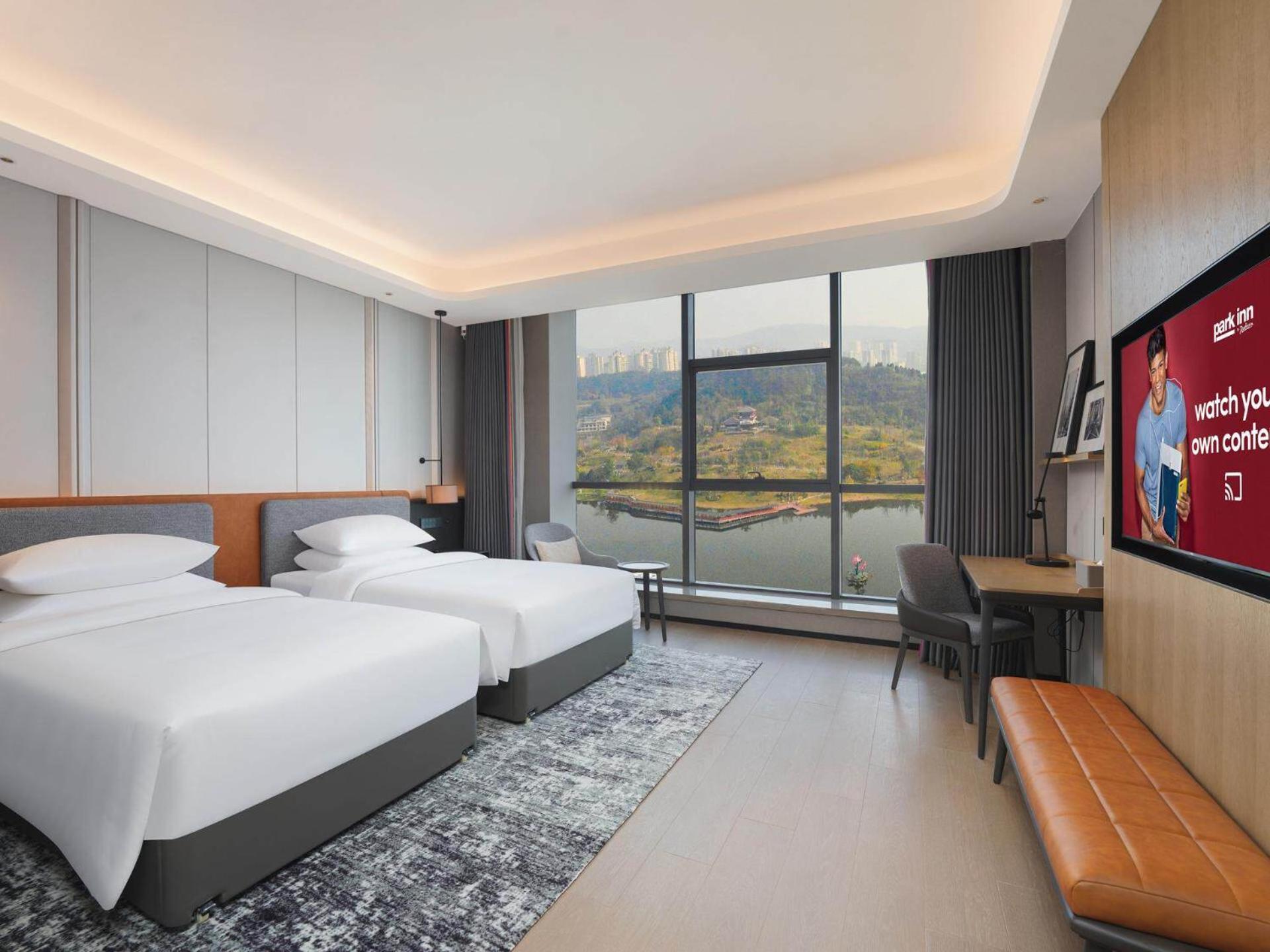 Park Inn By Radisson Nanchong Yilong Star City Plaza Exterior foto